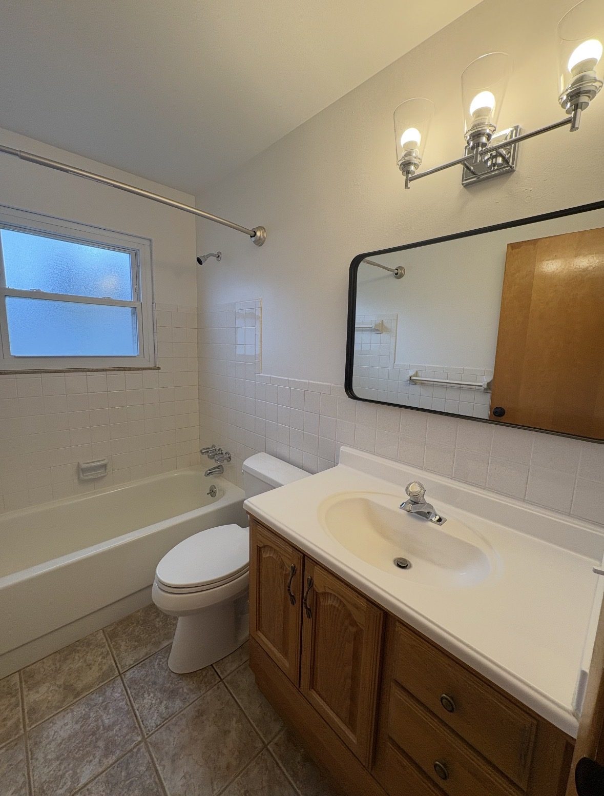 Freshly finished home interior with spotless hardwood floors after a construction final cleaning in Akron, Ohio