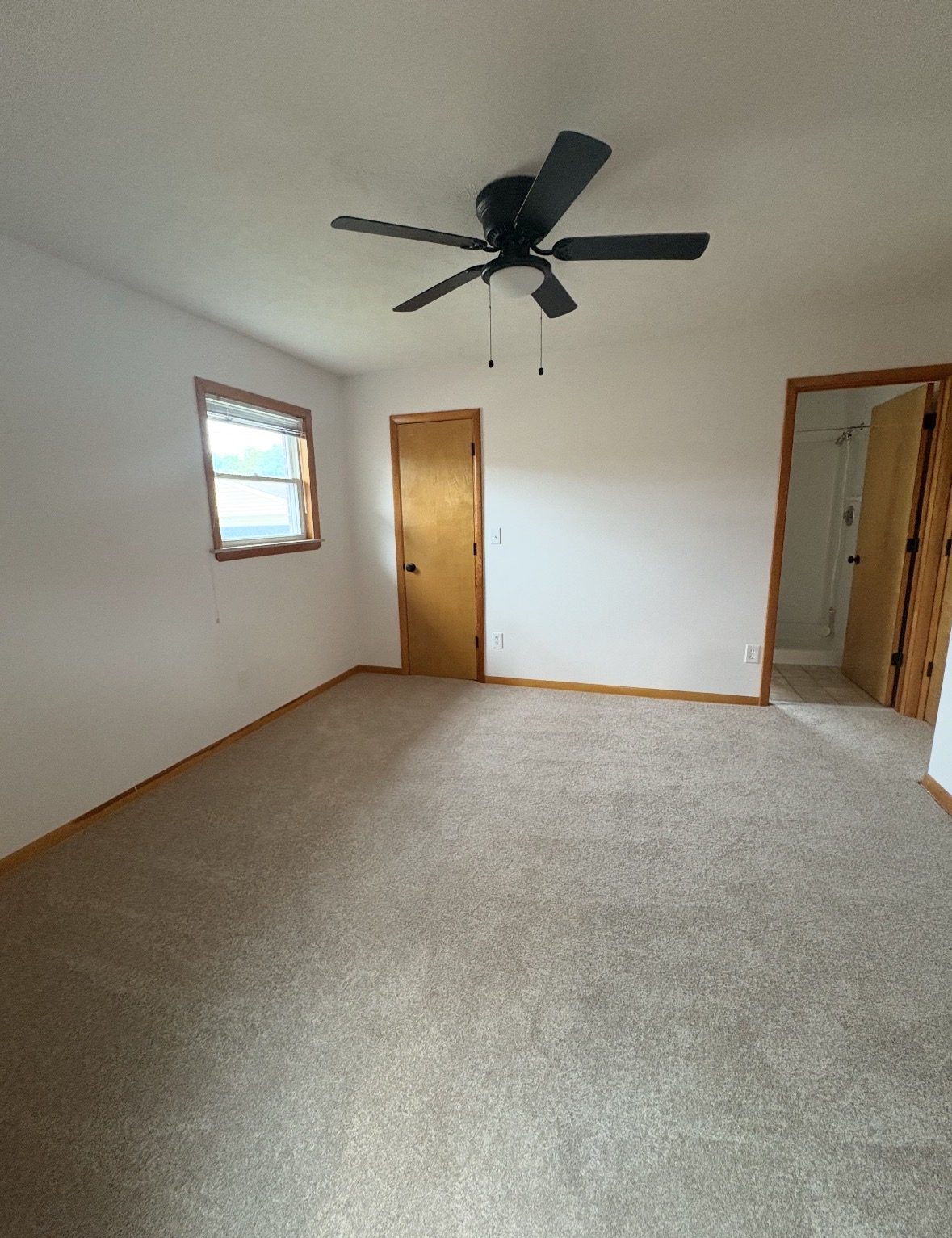 Freshly cleaned carpeted bedroom in an Akron area home