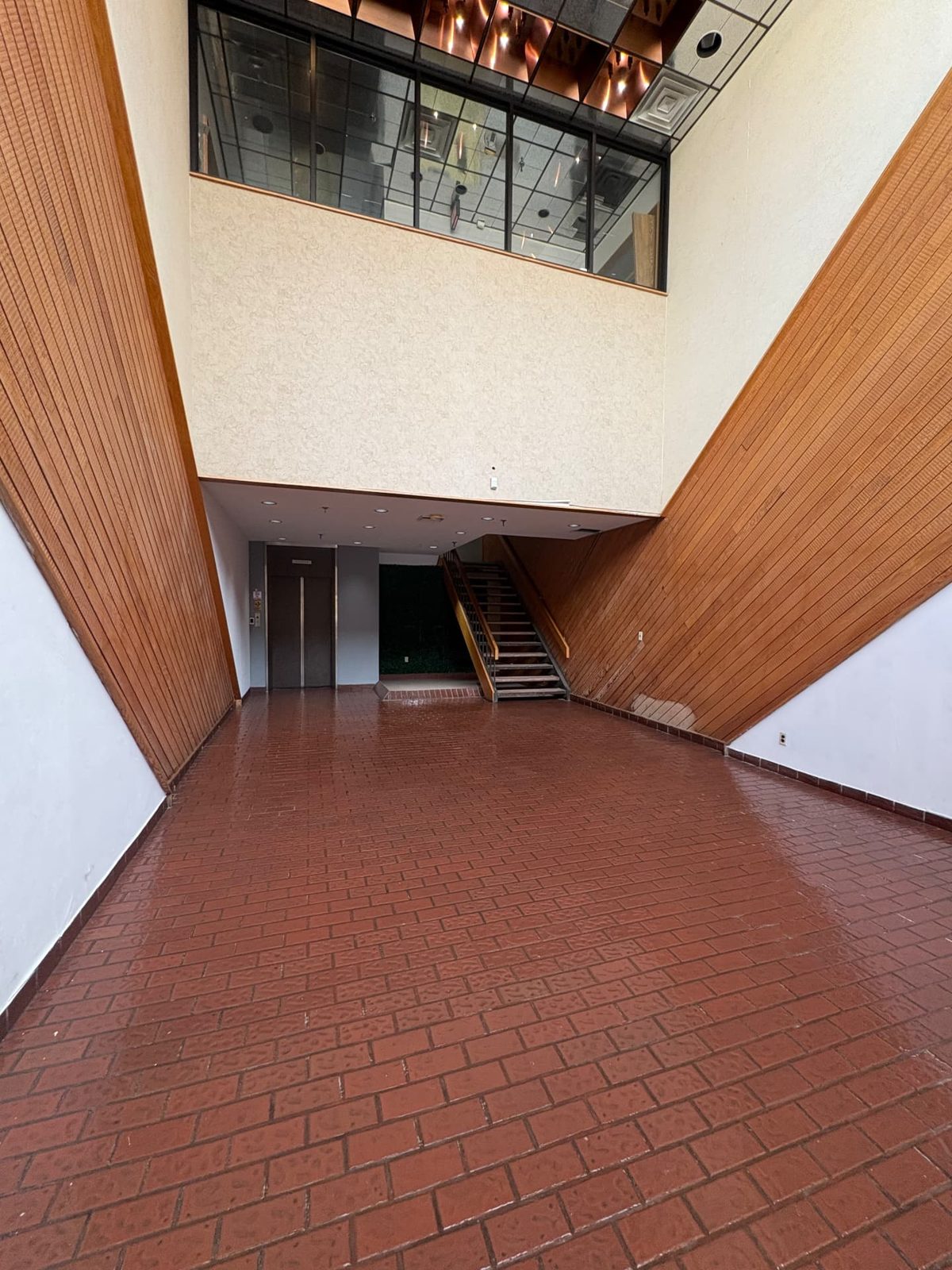 Clean, polished lobby floor after a final cleaning by Chloe's Cleaning Company